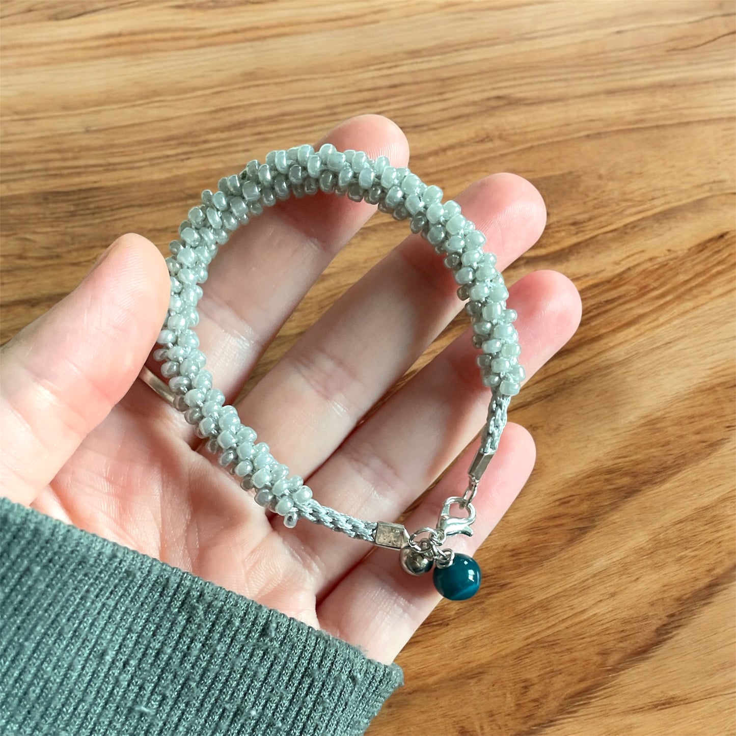 Bracelet kumihimo gris métallique