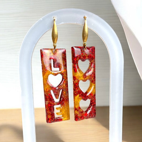 Boucles d'oreilles cœurs en résine rouge et or - bijoux cielo craft