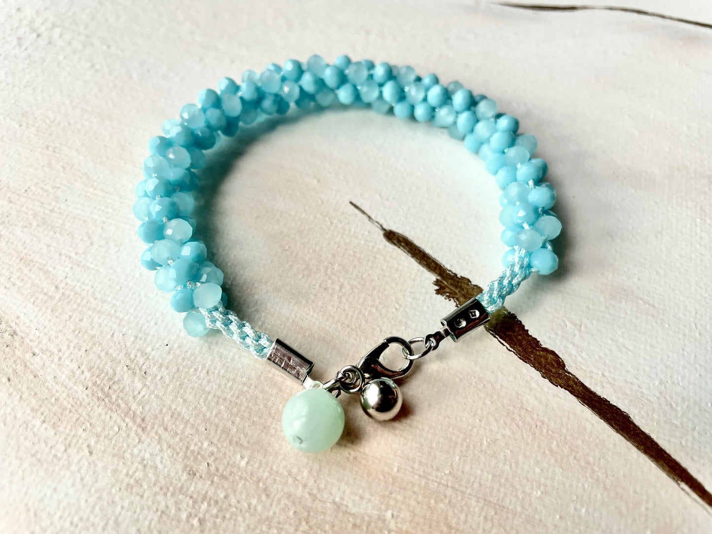 Bracelet Kumihimo en perles de riz bleu turquoise et sa pierre d'amazonite jade ~