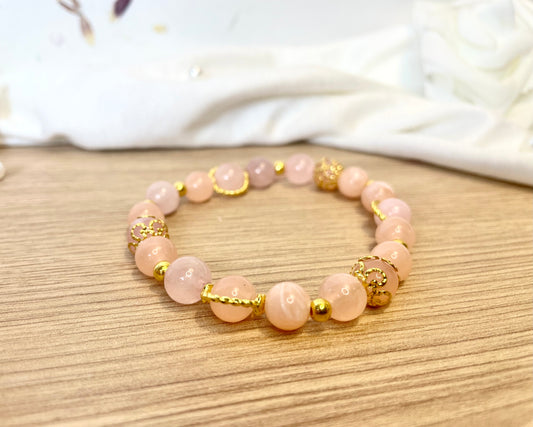Bracelet en pierres naturelles de quarts rose ~