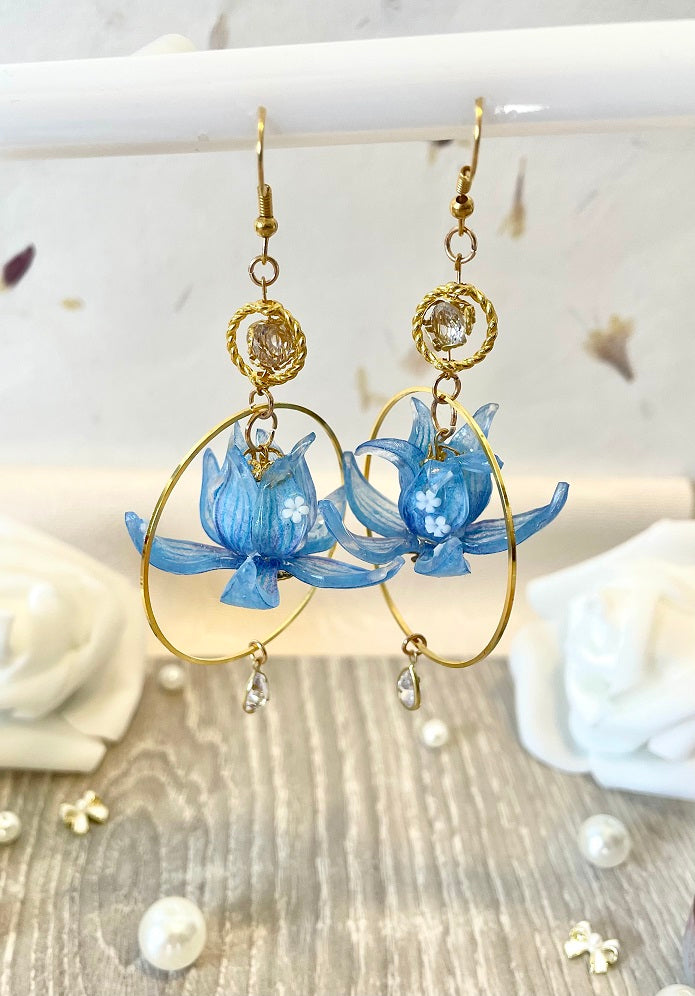 Boucles d'oreilles fleur de lotus bleu